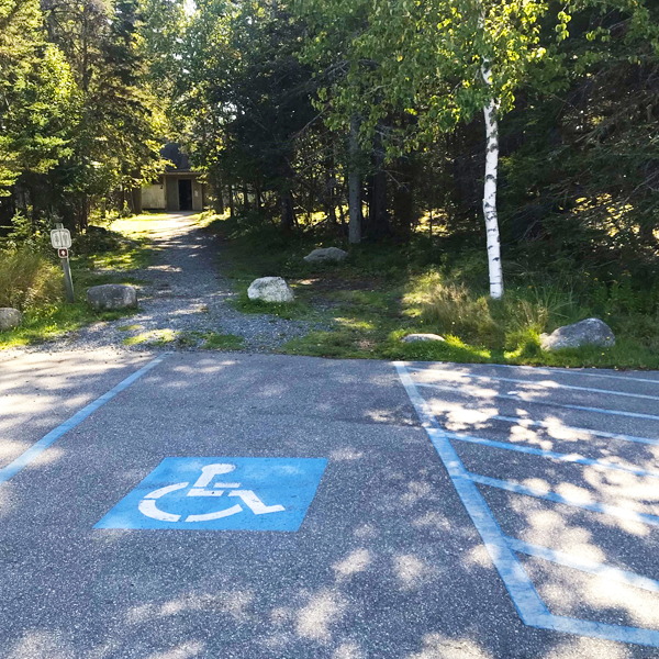 An accessible parking space at a park